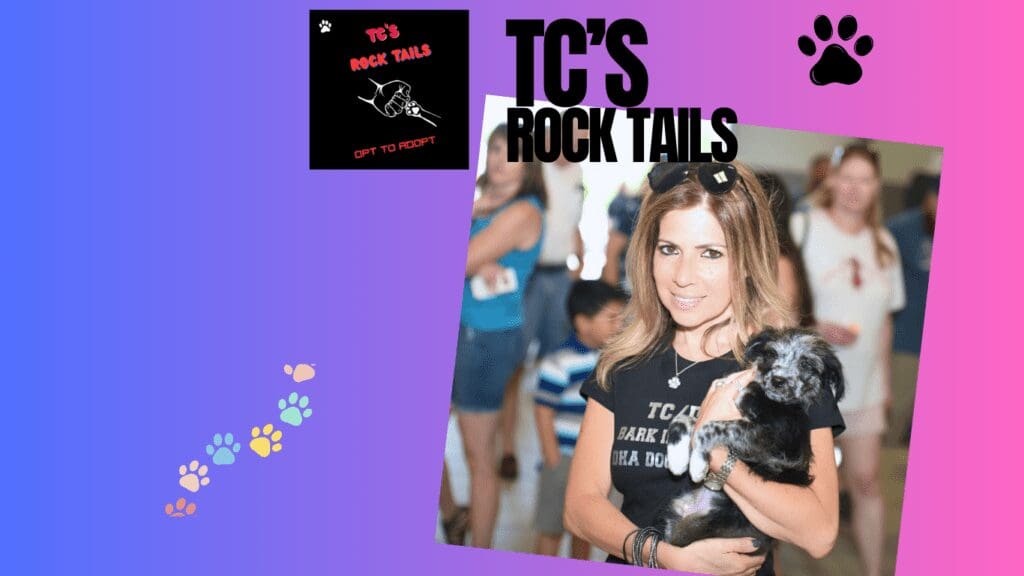 Woman holding dog at TC's Rock Tails event.