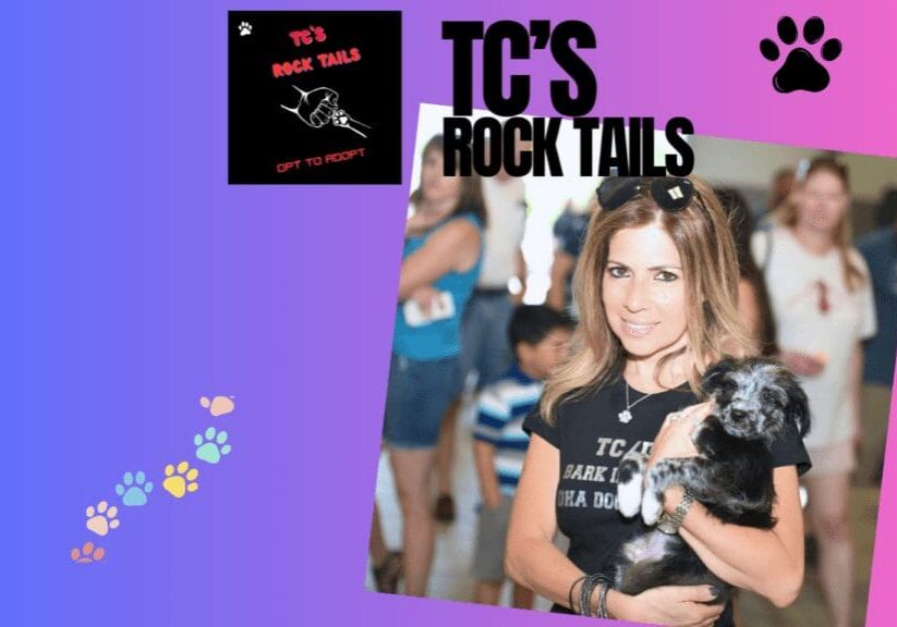 Woman holding dog at TC's Rock Tails event.